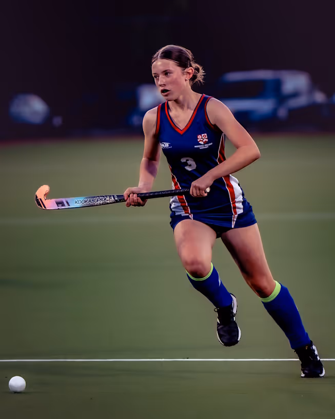 Rosehill College students playing hockey