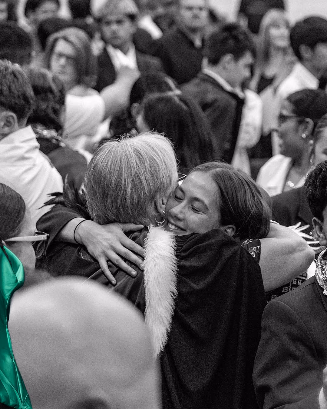 A Rosehill College student embracing a staff member at prizegiving
