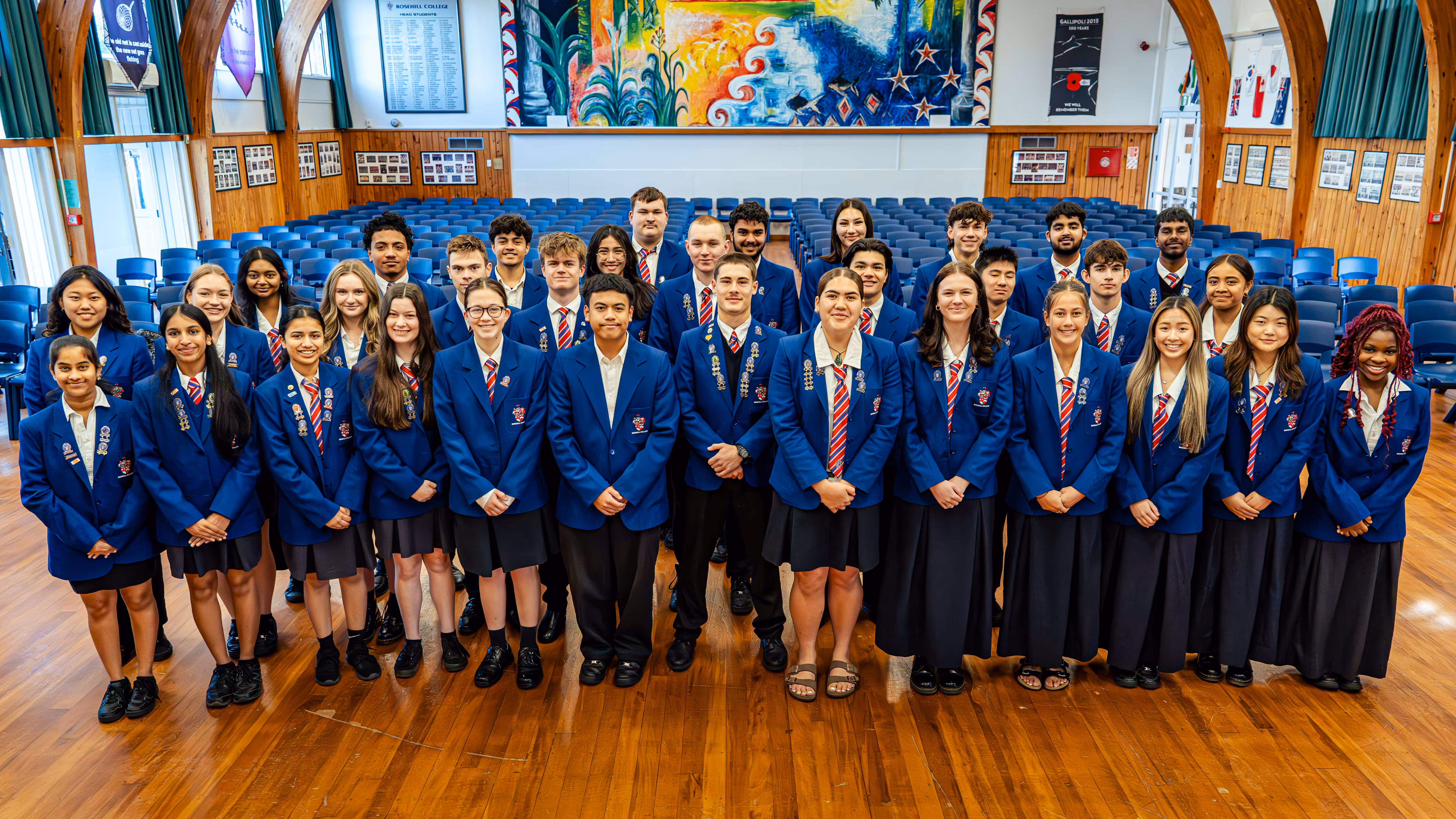 Senior Rosehill College students in school blazers in the school hall