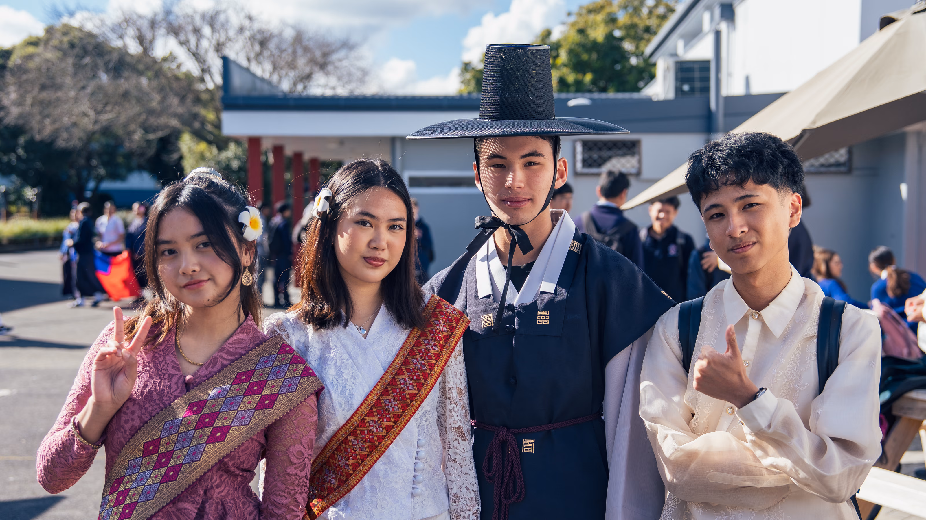 Rosehill College international students in cultural dress on campus